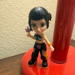 K-Pop Demon Hunter Vinyl Figurine with Black Hair and Multicolor Outfit